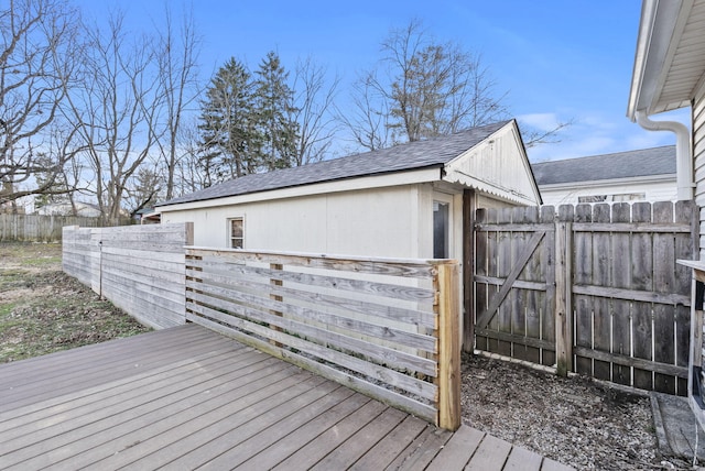 wooden deck featuring fence