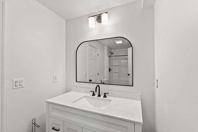 bathroom featuring vanity and walk in shower