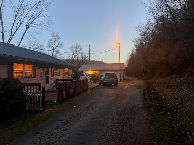 view of road with driveway