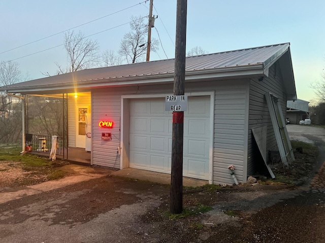 garage featuring driveway