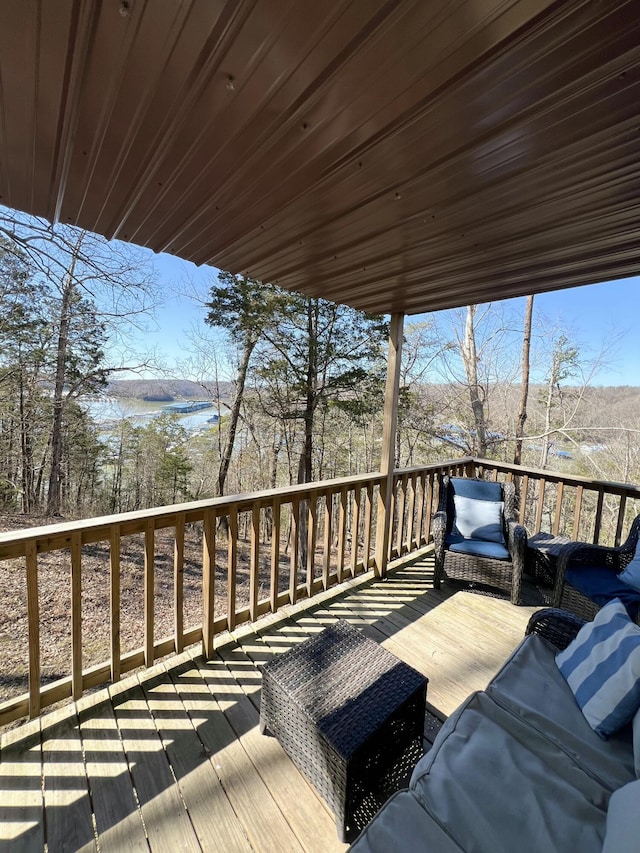 deck featuring a water view