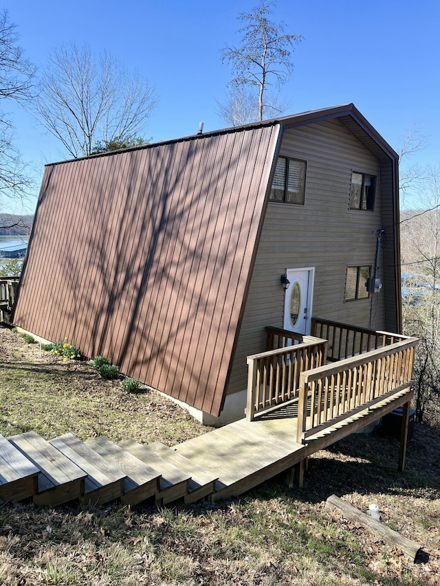 rear view of property with a deck