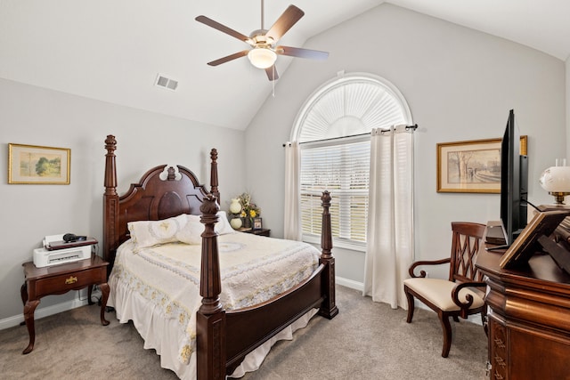 bedroom featuring visible vents, baseboards, light colored carpet, and vaulted ceiling