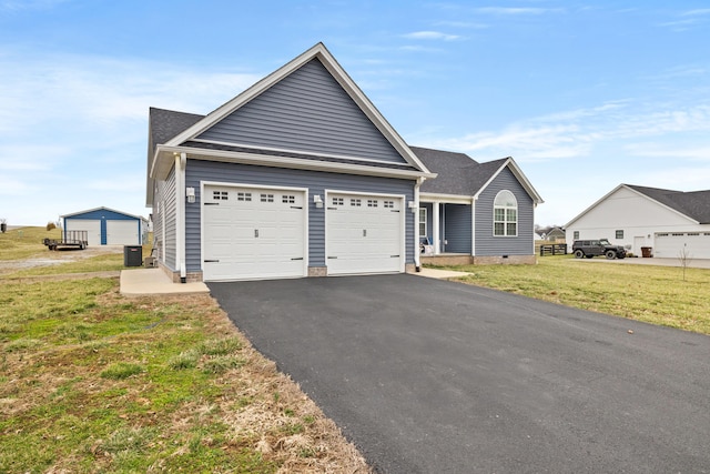 single story home featuring aphalt driveway, central AC, a front lawn, and a garage