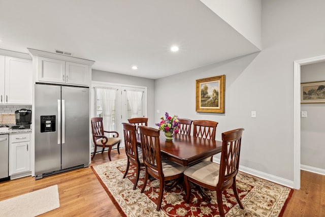 dining area featuring visible vents, recessed lighting, baseboards, and light wood-style floors