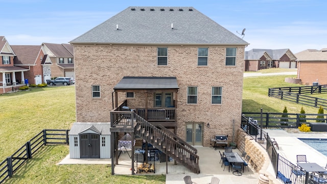 161 Tuscany Way, Richmond, KY 40475 - back of house with brick siding, a patio area, and stairs
