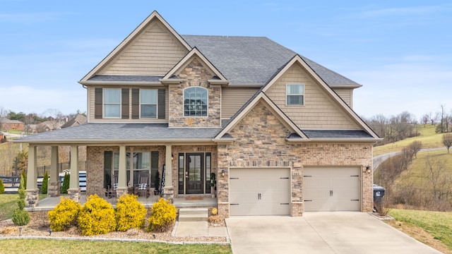 161 Tuscany Way, Richmond, KY 40475 - craftsman-style house with covered porch, a garage, a shingled roof, concrete driveway, and brick siding