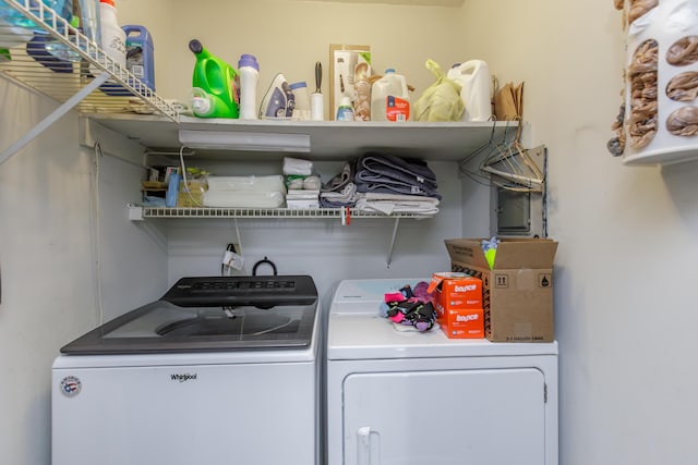 clothes washing area with laundry area and independent washer and dryer