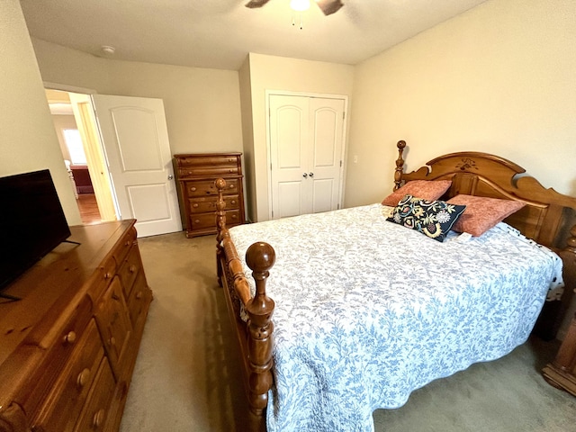 bedroom featuring a closet, carpet flooring, and ceiling fan