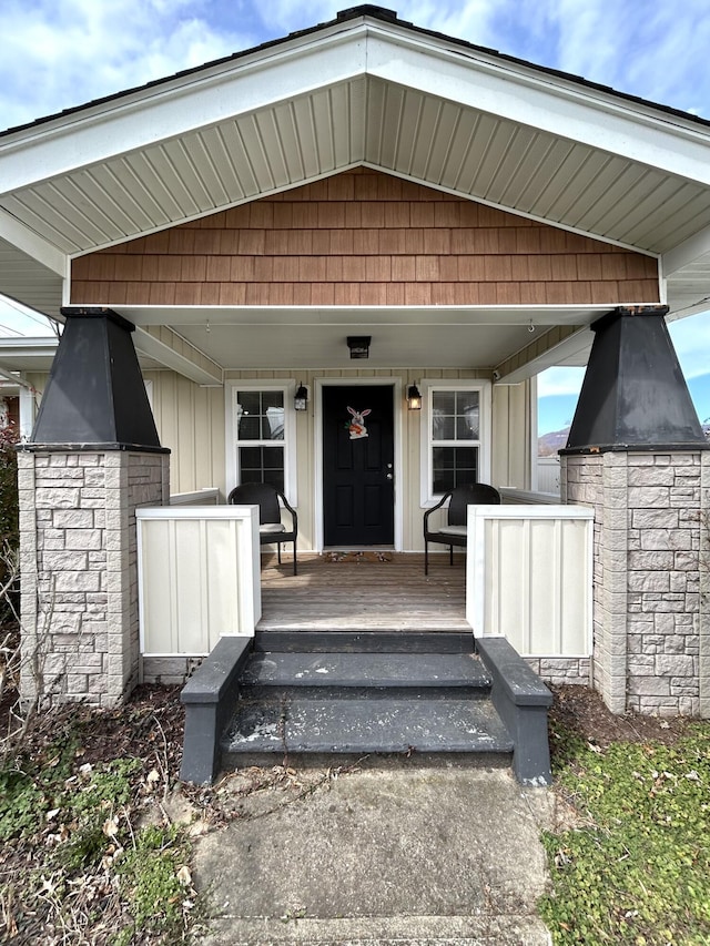 property entrance with covered porch