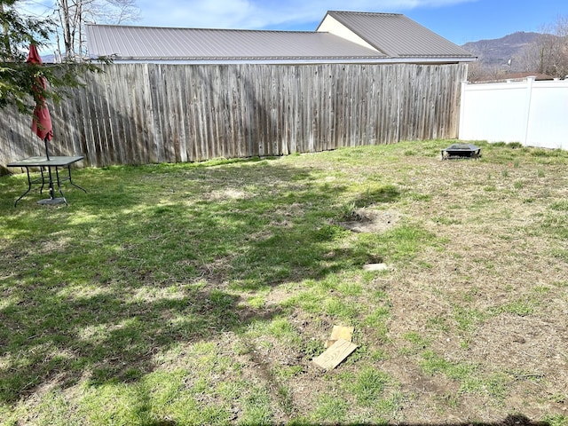 view of yard with fence