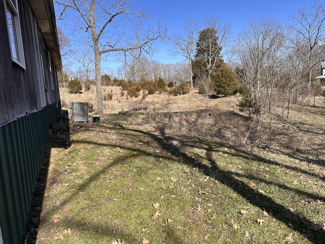 view of yard with central AC