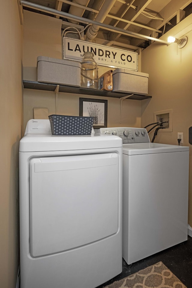 laundry area with independent washer and dryer and laundry area