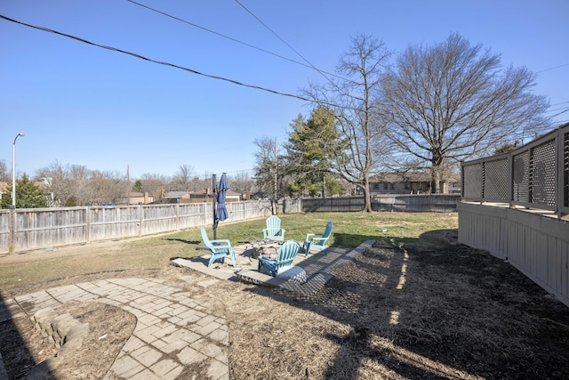 view of yard featuring a fenced backyard and a patio area