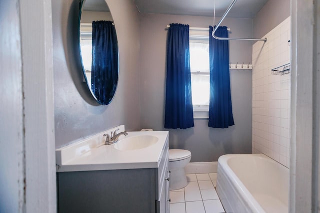 full bath with vanity, tile patterned floors, toilet, and baseboards