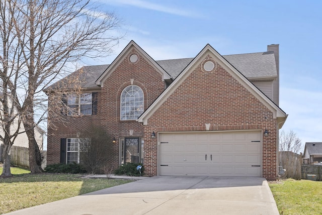 view of front of property with a garage, brick siding, concrete driveway, and fence