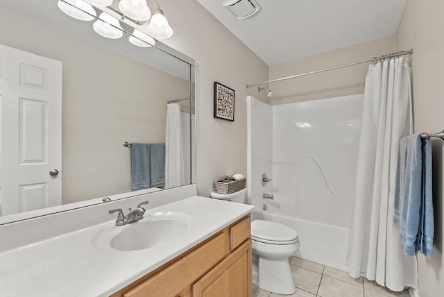 bathroom featuring vanity, visible vents, shower / bath combo, tile patterned floors, and toilet