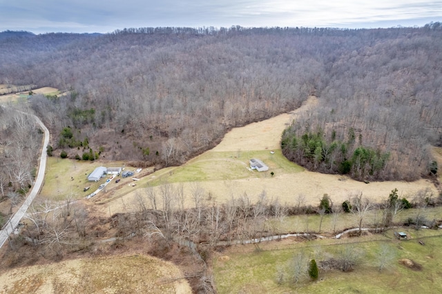 aerial view featuring a forest view