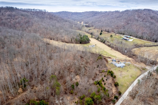 aerial view featuring a forest view