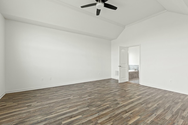 unfurnished bedroom featuring a ceiling fan, ensuite bath, dark wood-style floors, baseboards, and vaulted ceiling