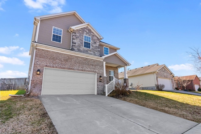 view of front of home featuring brick siding, driveway, a front yard, and fence