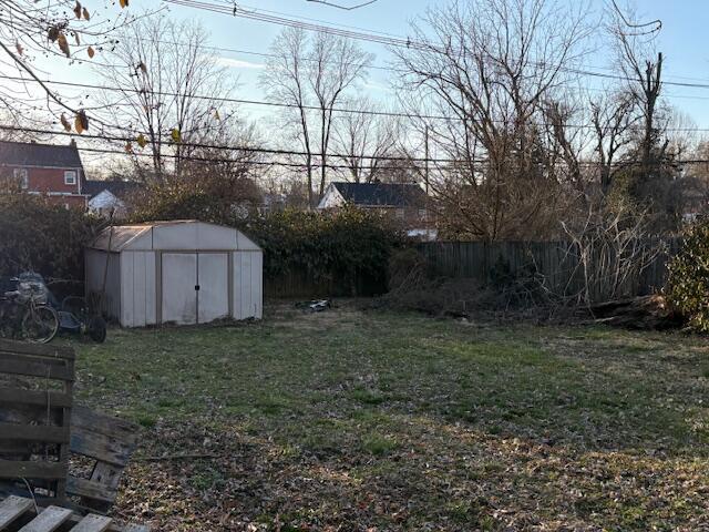 108 Linden Ave, Frankfort, KY 40601 - view of yard with a storage unit, an outbuilding, and fence