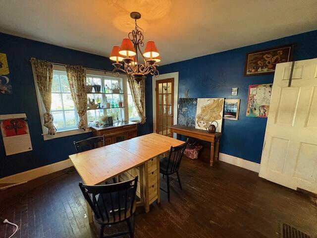 108 Linden Ave, Frankfort, KY 40601 - dining area with baseboards, dark wood-style floors, visible vents, and an inviting chandelier
