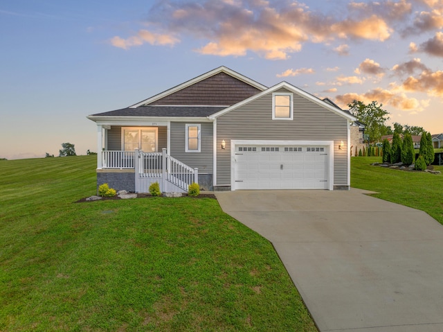 view of front of house featuring covered porch, concrete driveway, and a front yard