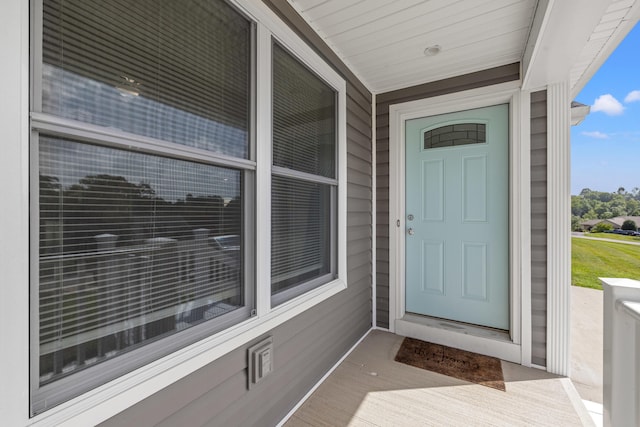 doorway to property featuring a porch