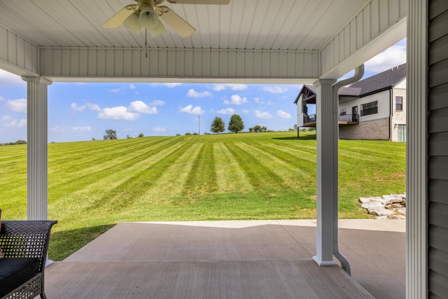 view of patio featuring a ceiling fan