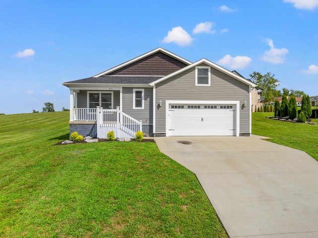 view of front of house featuring a porch, concrete driveway, and a front lawn