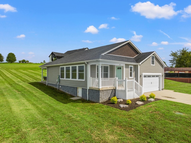 view of front of property featuring driveway, a porch, roof with shingles, a front yard, and a garage