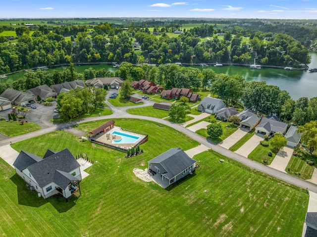 bird's eye view with a residential view and a water view