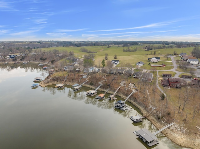 drone / aerial view with a rural view and a water view