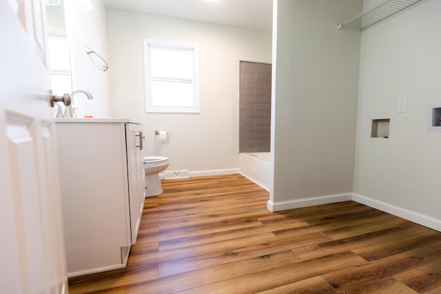 full bathroom with vanity, wood finished floors, visible vents, baseboards, and toilet