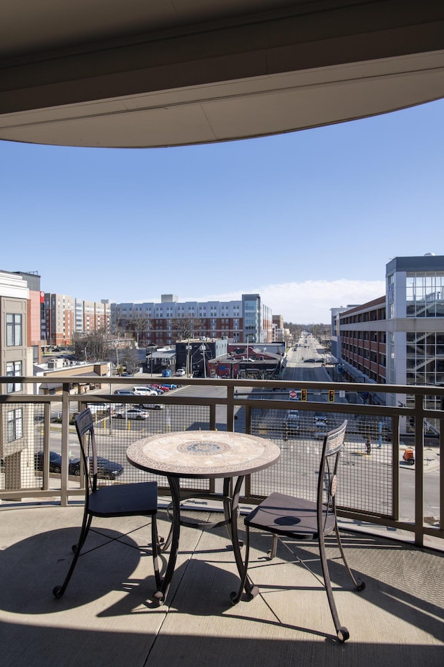 balcony featuring a city view