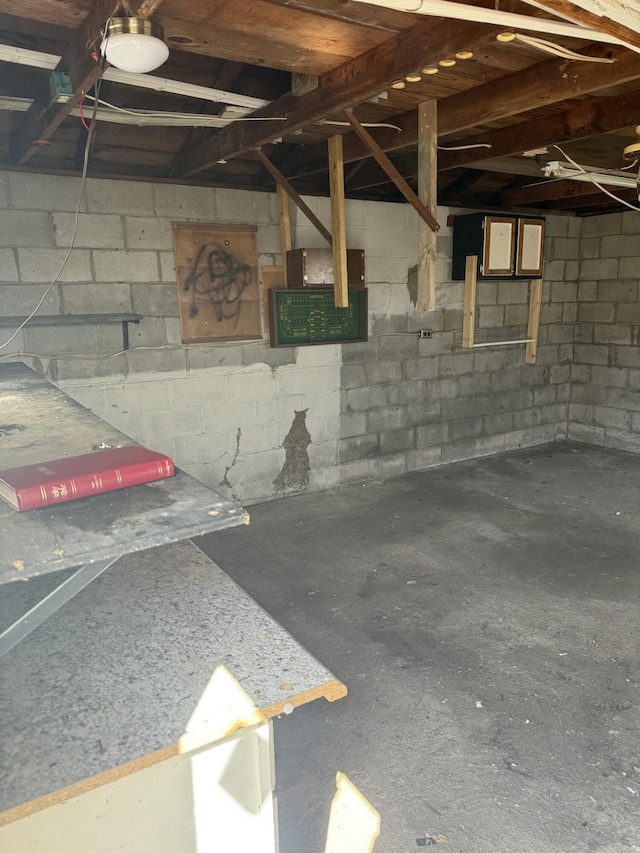 interior space featuring concrete block wall