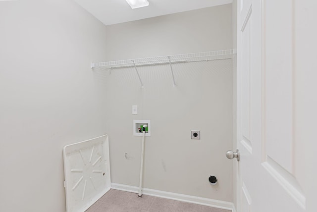 washroom with light tile patterned floors, baseboards, laundry area, electric dryer hookup, and washer hookup