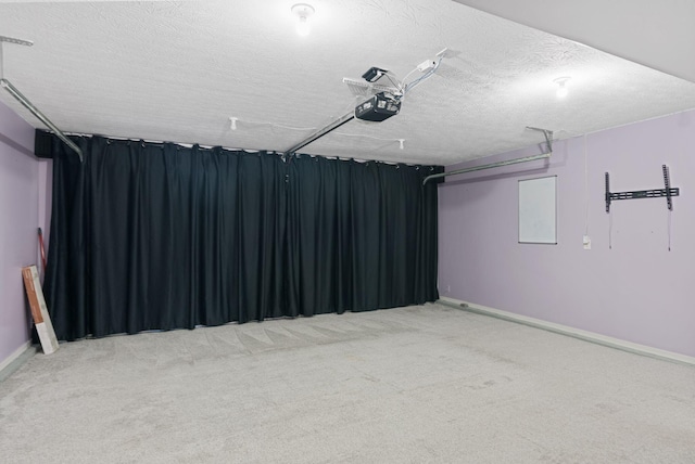 interior space featuring baseboards and a textured ceiling