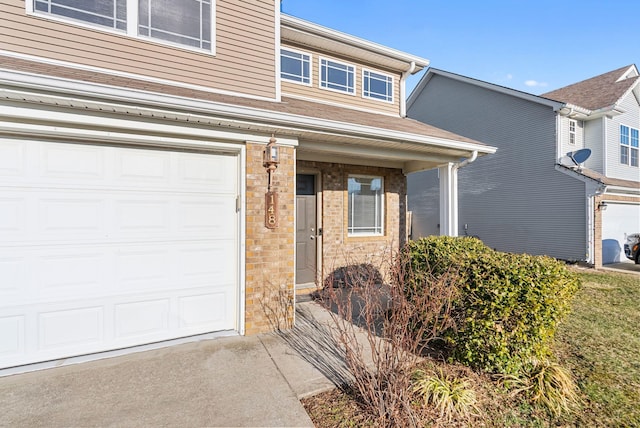 view of front of home featuring brick siding