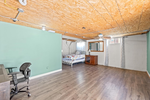 bedroom with wood finished floors