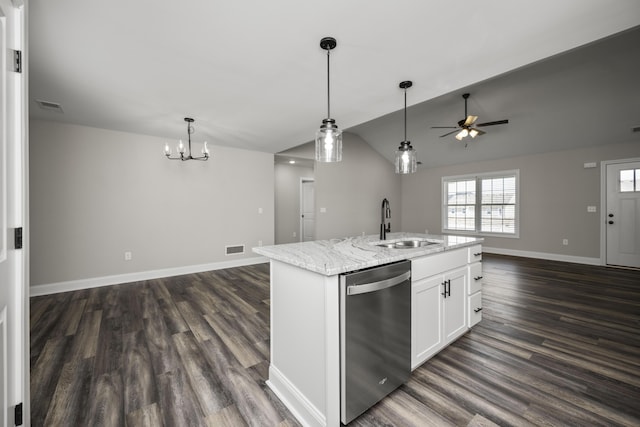 kitchen with dark wood-type flooring, a sink, stainless steel dishwasher, open floor plan, and white cabinets