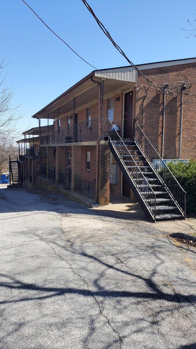 view of building exterior with stairs