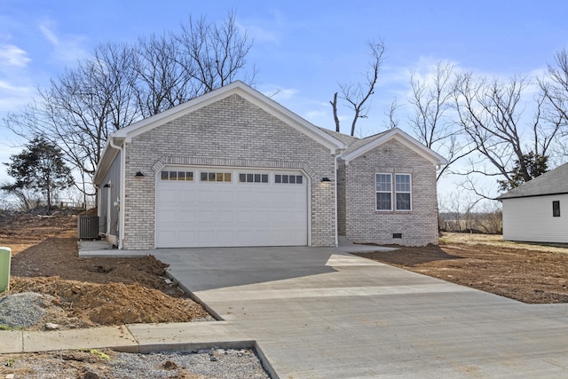 single story home featuring brick siding, central air condition unit, a garage, crawl space, and driveway