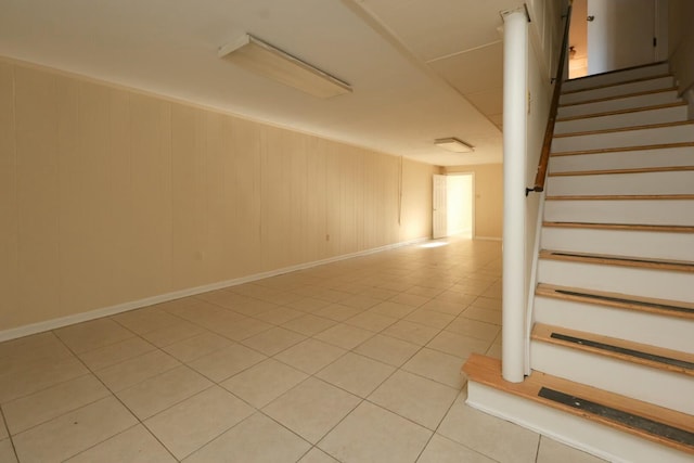 stairs with tile patterned flooring