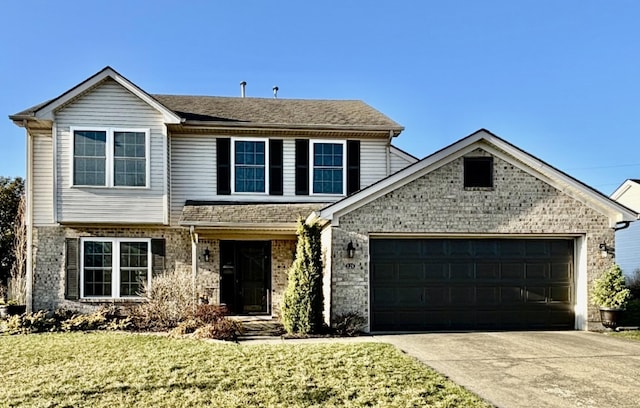 view of front of property with brick siding, driveway, an attached garage, and a front lawn