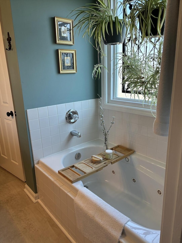 bathroom with a whirlpool tub