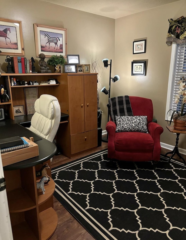 office space with baseboards and dark wood-type flooring