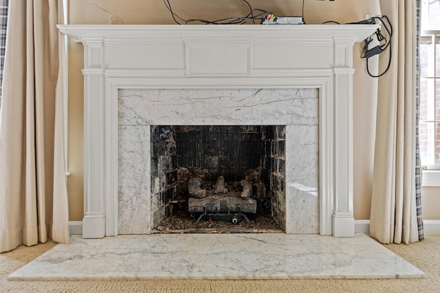 interior details with a fireplace