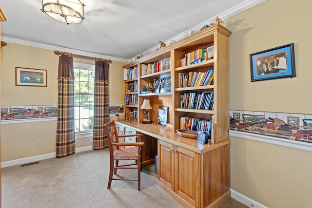 home office featuring crown molding, light colored carpet, visible vents, and baseboards